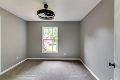 Embrace luxury living at its finest in this fully renovated on Canongate At Olde Atlanta Golf Club in Georgia - for sale on GolfHomes.com, golf home, golf lot
