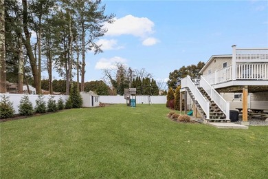 Set in the heart of Warwick Neck, this thoughtfully reimagined on Warwick Country Club in Rhode Island - for sale on GolfHomes.com, golf home, golf lot