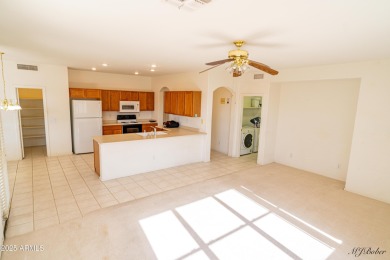 Discover a vibrant community lifestyle in this 3-bedroom, 2-bath on Arizona Traditions Golf Club in Arizona - for sale on GolfHomes.com, golf home, golf lot