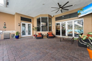 Welcome to this exquisite custom-built courtyard home, perfectly on The Cape Club of Palm City in Florida - for sale on GolfHomes.com, golf home, golf lot