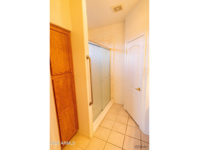 Discover a vibrant community lifestyle in this 3-bedroom, 2-bath on Arizona Traditions Golf Club in Arizona - for sale on GolfHomes.com, golf home, golf lot