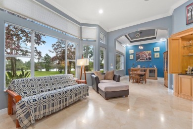 Welcome to this exquisite custom-built courtyard home, perfectly on The Cape Club of Palm City in Florida - for sale on GolfHomes.com, golf home, golf lot