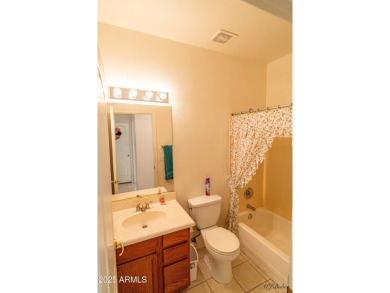 Discover a vibrant community lifestyle in this 3-bedroom, 2-bath on Arizona Traditions Golf Club in Arizona - for sale on GolfHomes.com, golf home, golf lot