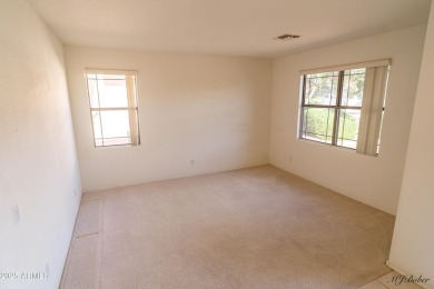 Discover a vibrant community lifestyle in this 3-bedroom, 2-bath on Arizona Traditions Golf Club in Arizona - for sale on GolfHomes.com, golf home, golf lot