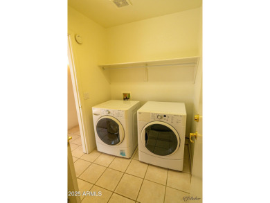 Discover a vibrant community lifestyle in this 3-bedroom, 2-bath on Arizona Traditions Golf Club in Arizona - for sale on GolfHomes.com, golf home, golf lot