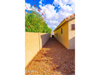 Discover a vibrant community lifestyle in this 3-bedroom, 2-bath on Arizona Traditions Golf Club in Arizona - for sale on GolfHomes.com, golf home, golf lot