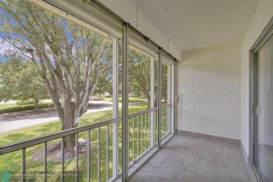 Hi, I'm your dream 2 bed/2 bath newly renovated condo, and on Wynmoor Golf Course in Florida - for sale on GolfHomes.com, golf home, golf lot