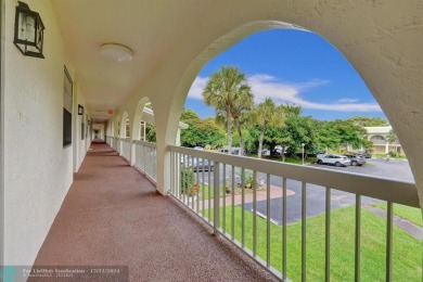 Hi, I'm your dream 2 bed/2 bath newly renovated condo, and on Wynmoor Golf Course in Florida - for sale on GolfHomes.com, golf home, golf lot