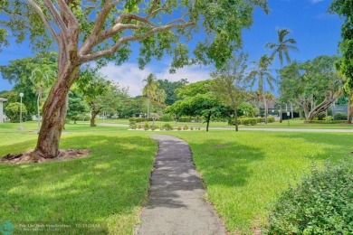 Hi, I'm your dream 2 bed/2 bath newly renovated condo, and on Wynmoor Golf Course in Florida - for sale on GolfHomes.com, golf home, golf lot