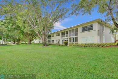 Hi, I'm your dream 2 bed/2 bath newly renovated condo, and on Wynmoor Golf Course in Florida - for sale on GolfHomes.com, golf home, golf lot