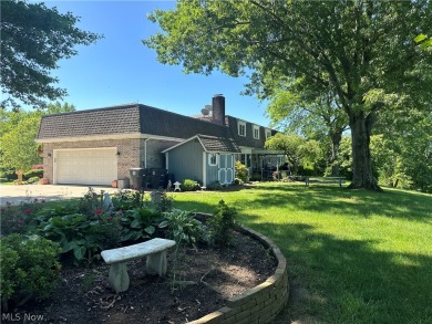 Welcome to your dream home! Nestled on the eighth hole of an on Steubenville Country Club in Ohio - for sale on GolfHomes.com, golf home, golf lot