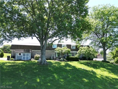 Welcome to your dream home! Nestled on the eighth hole of an on Steubenville Country Club in Ohio - for sale on GolfHomes.com, golf home, golf lot