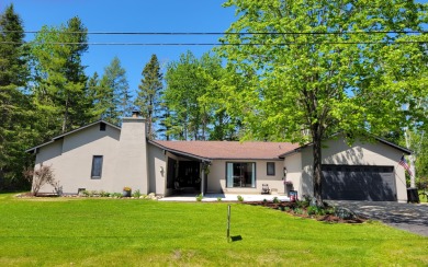 This move-in ready home is located on a very desirable street on Alpena Golf Course in Michigan - for sale on GolfHomes.com, golf home, golf lot