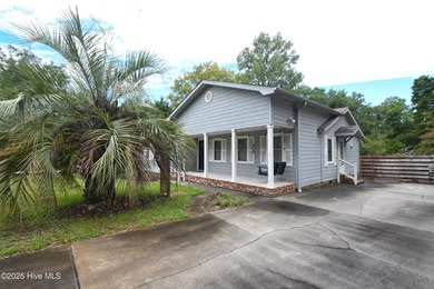 Some homes are unassuming from the outside and absolutely on Sea Trail Golf Resort in North Carolina - for sale on GolfHomes.com, golf home, golf lot