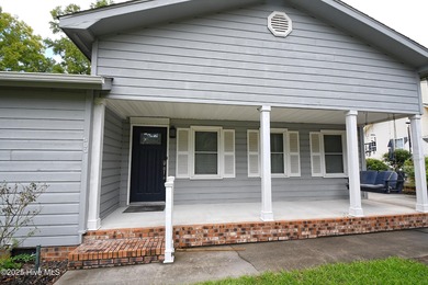 Some homes are unassuming from the outside and absolutely on Sea Trail Golf Resort in North Carolina - for sale on GolfHomes.com, golf home, golf lot