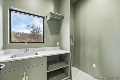 BRAND NEW CUSTOM HOME located on the 3 Mile Marker of Horseshoe on Seasons Ridge At Four Seasons in Missouri - for sale on GolfHomes.com, golf home, golf lot