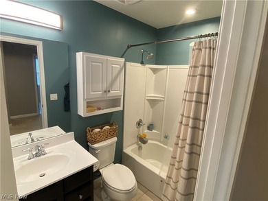 Welcome to your dream home! Tucked away in a charming cul-de-sac on Grey Hawk Golf Club in Ohio - for sale on GolfHomes.com, golf home, golf lot