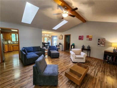 Welcome to this inviting Bella Vista corner-lot home designed on Bella Vista - Metfield Golf Complex and Country Club in Arkansas - for sale on GolfHomes.com, golf home, golf lot