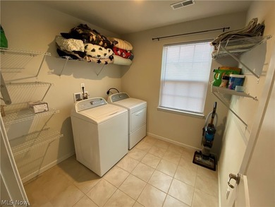 Welcome to your dream home! Tucked away in a charming cul-de-sac on Grey Hawk Golf Club in Ohio - for sale on GolfHomes.com, golf home, golf lot