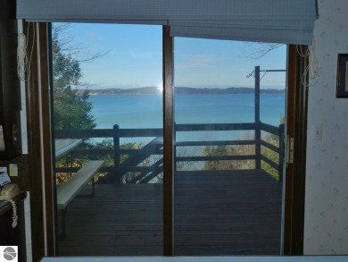EAST BAY WATERFRONT HOME! Great  East Bay & Sunset Views! 103 Ft on Lochen Heath Golf Course in Michigan - for sale on GolfHomes.com, golf home, golf lot