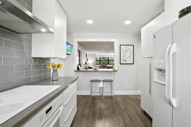Don't miss your chance to own this beautifully remodeled on Sunrise Lakes Phase IV Golf Course in Florida - for sale on GolfHomes.com, golf home, golf lot