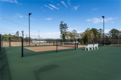 Experience the epitome of luxurious, age-targeted living at on Grand National Golf Course in Alabama - for sale on GolfHomes.com, golf home, golf lot