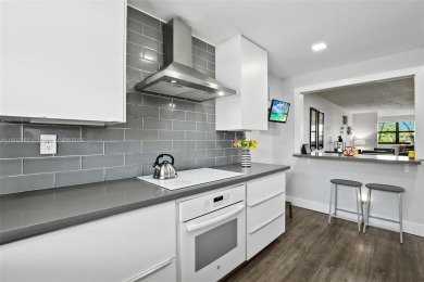 Don't miss your chance to own this beautifully remodeled on Sunrise Lakes Phase IV Golf Course in Florida - for sale on GolfHomes.com, golf home, golf lot