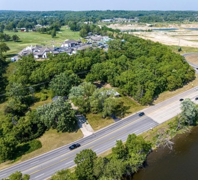 PLEASE NOTE: This property has officially been removed from the on Blythefield Country Club in Michigan - for sale on GolfHomes.com, golf home, golf lot