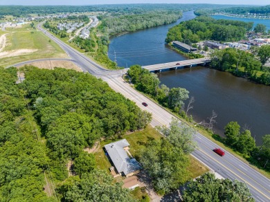 PLEASE NOTE: This property has officially been removed from the on Blythefield Country Club in Michigan - for sale on GolfHomes.com, golf home, golf lot