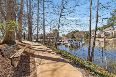Enjoy the peace and perks of lake life and a private on The Golf Club of Georgia in Georgia - for sale on GolfHomes.com, golf home, golf lot