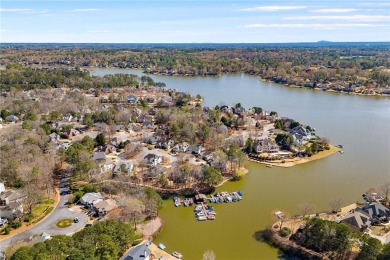Enjoy the peace and perks of lake life and a private on The Golf Club of Georgia in Georgia - for sale on GolfHomes.com, golf home, golf lot
