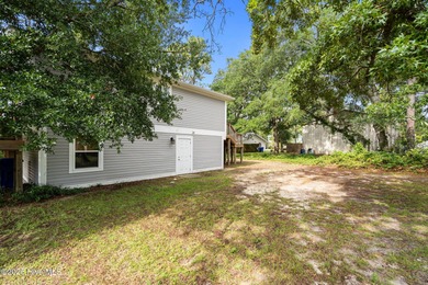 This fully furnished pristine open floor plan beach home offers on Founders Club At St. James Plantation in North Carolina - for sale on GolfHomes.com, golf home, golf lot