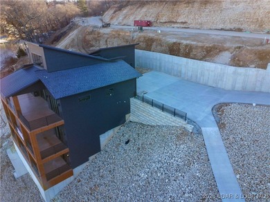 BRAND NEW CUSTOM HOME located on the 3 Mile Marker of Horseshoe on Seasons Ridge At Four Seasons in Missouri - for sale on GolfHomes.com, golf home, golf lot