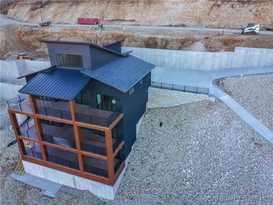 BRAND NEW CUSTOM HOME located on the 3 Mile Marker of Horseshoe on Seasons Ridge At Four Seasons in Missouri - for sale on GolfHomes.com, golf home, golf lot