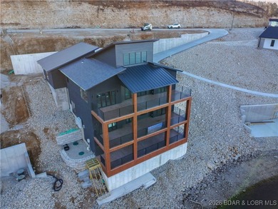 BRAND NEW CUSTOM HOME located on the 3 Mile Marker of Horseshoe on Seasons Ridge At Four Seasons in Missouri - for sale on GolfHomes.com, golf home, golf lot