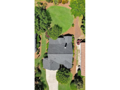 Tee off into the good life at 30 St. Simons Drive! Perfectly on Island West Golf Club in South Carolina - for sale on GolfHomes.com, golf home, golf lot