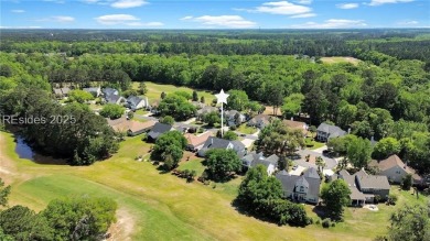 Tee off into the good life at 30 St. Simons Drive! Perfectly on Island West Golf Club in South Carolina - for sale on GolfHomes.com, golf home, golf lot