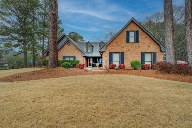 Welcome home to this beautiful 4-bedroom, 2.5-bath all-brick on Honey Creek Country Club in Georgia - for sale on GolfHomes.com, golf home, golf lot