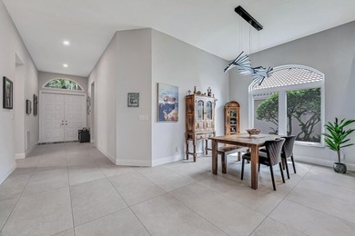 This beautiful open concept renovated home is one you will not on Fountains Golf and Country Club in Florida - for sale on GolfHomes.com, golf home, golf lot