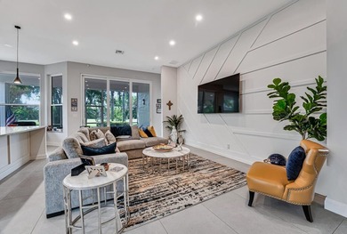 This beautiful open concept renovated home is one you will not on Fountains Golf and Country Club in Florida - for sale on GolfHomes.com, golf home, golf lot