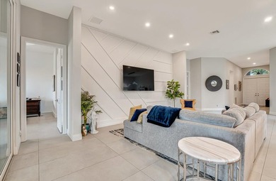 This beautiful open concept renovated home is one you will not on Fountains Golf and Country Club in Florida - for sale on GolfHomes.com, golf home, golf lot