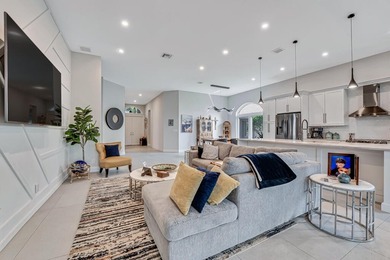 This beautiful open concept renovated home is one you will not on Fountains Golf and Country Club in Florida - for sale on GolfHomes.com, golf home, golf lot