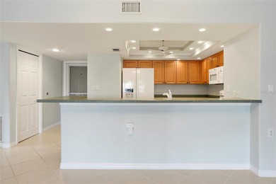 Prime Waterfront Condo in Banyan Point - Punta Gorda Isles on Saint Andrews South Golf Club in Florida - for sale on GolfHomes.com, golf home, golf lot