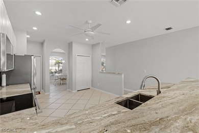 SILVERLAKES SHOWSTOPPER WITH BRAND NEW TILE ROOF & WATERFRONT on Gateway Golf and Country Club in Florida - for sale on GolfHomes.com, golf home, golf lot