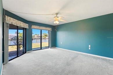 Prime Waterfront Condo in Banyan Point - Punta Gorda Isles on Saint Andrews South Golf Club in Florida - for sale on GolfHomes.com, golf home, golf lot