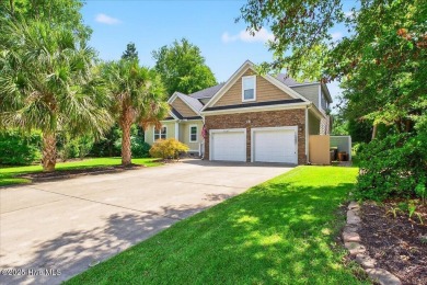 Tucked near the end of a quiet cul-de-sac and bordered by the on Brick Landing Plantation Yacht and Golf Club in North Carolina - for sale on GolfHomes.com, golf home, golf lot