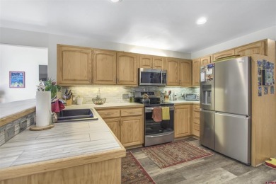 F. Lynn Johnson, Sherpa Real Estate, C: , Lynn,  : BRIGHT AND on Pagosa Springs Golf Club in Colorado - for sale on GolfHomes.com, golf home, golf lot