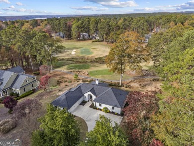 Must see this beautiful updated ranch home nestled in the on Reynolds Lake Oconee - The Landing in Georgia - for sale on GolfHomes.com, golf home, golf lot