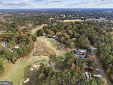 Must see this beautiful updated ranch home nestled in the on Reynolds Lake Oconee - The Landing in Georgia - for sale on GolfHomes.com, golf home, golf lot