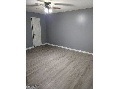 Discover this beautifully updated home nestled in a desirable on Golf Club of Macon in Georgia - for sale on GolfHomes.com, golf home, golf lot
